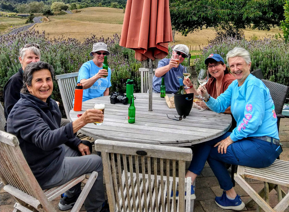 women gathered around table enjoying each others company